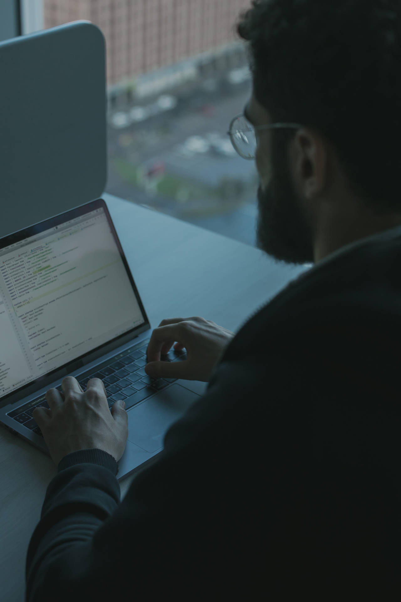 Engineer Typing On A Laptop Background