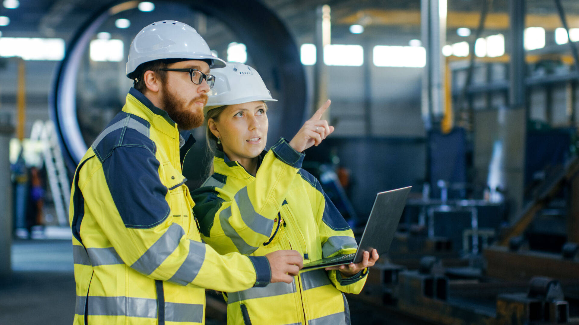 Engineers Working And Holding Laptop Background