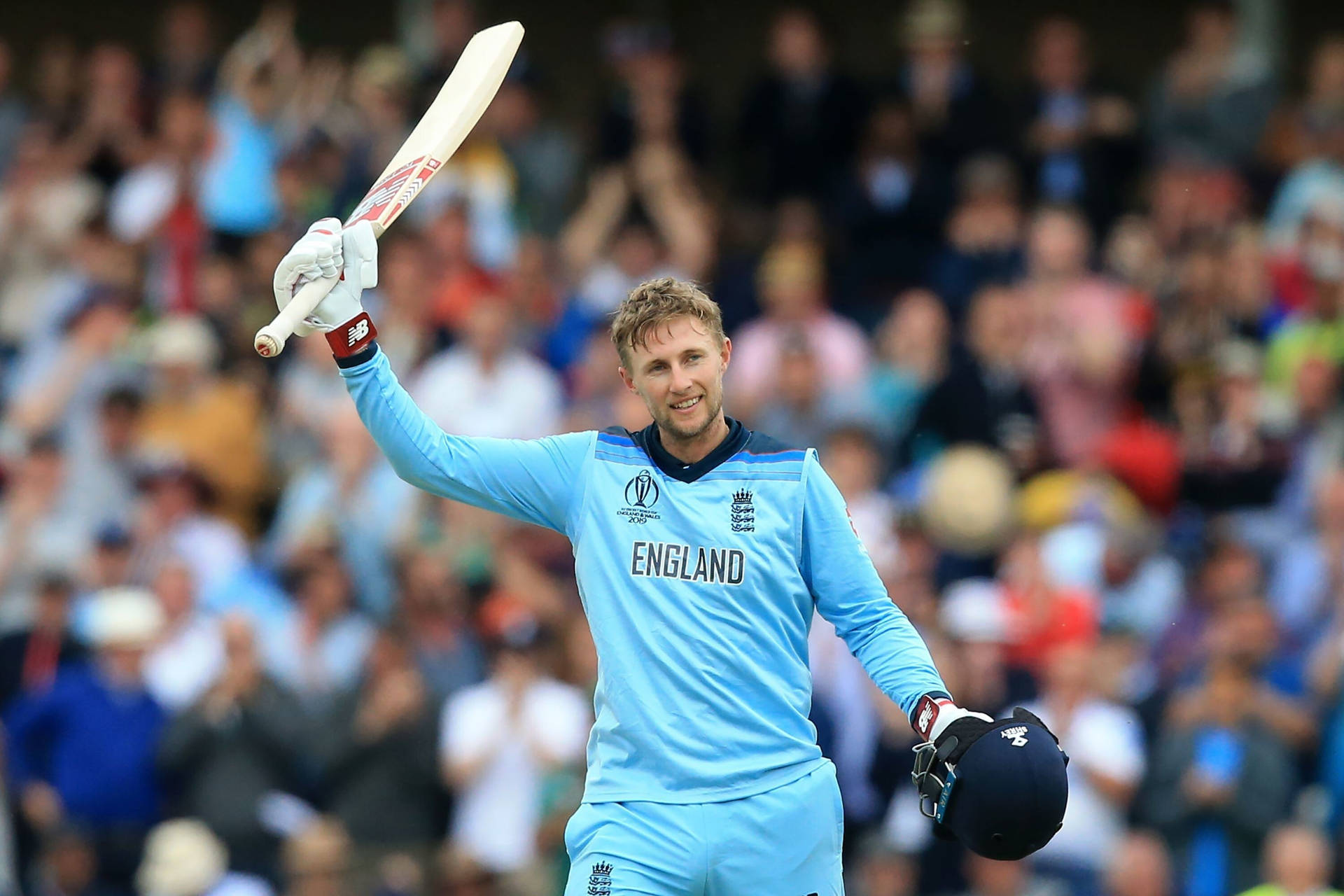 England Cricketer Joe Root In Action Background