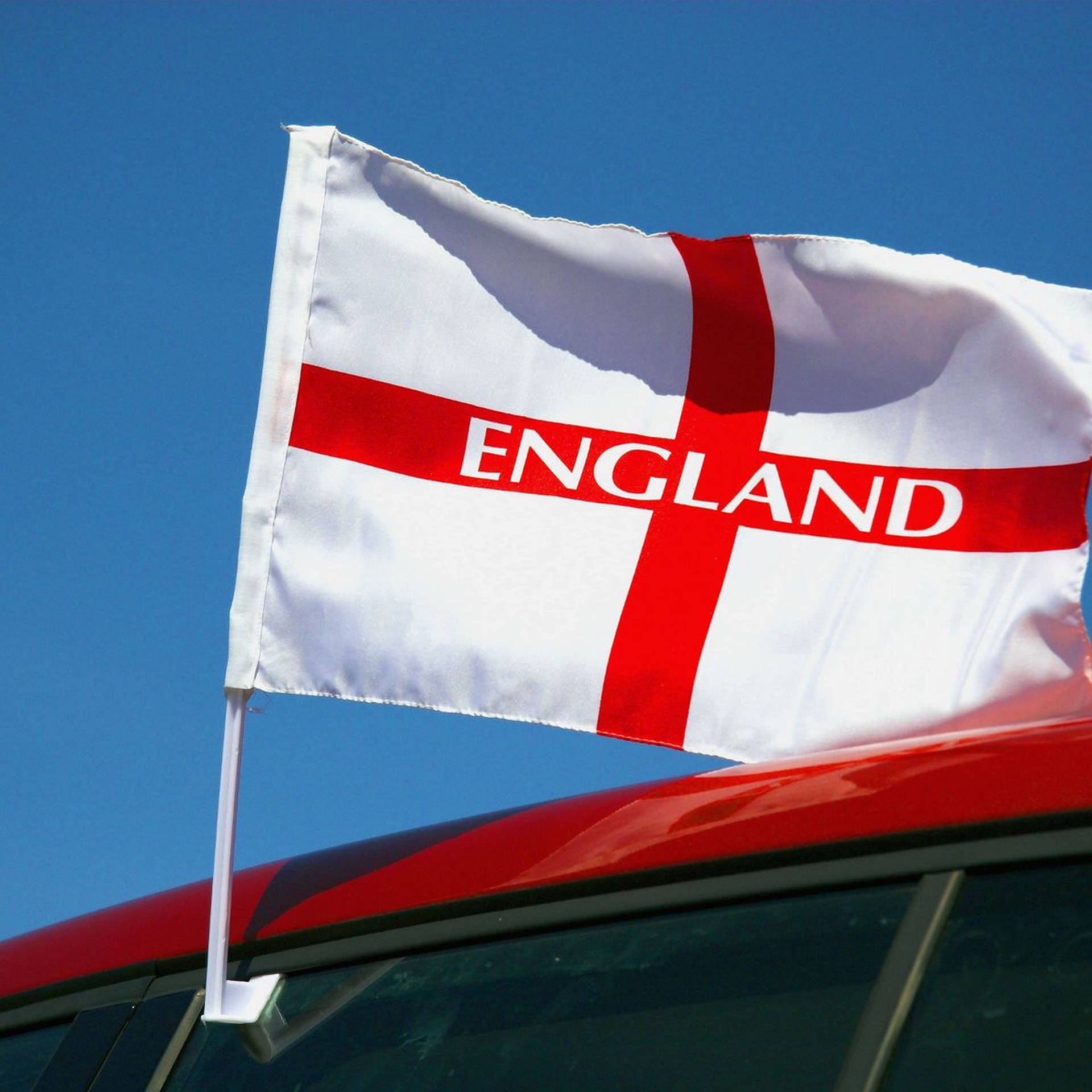 England Flag On Window Car Background