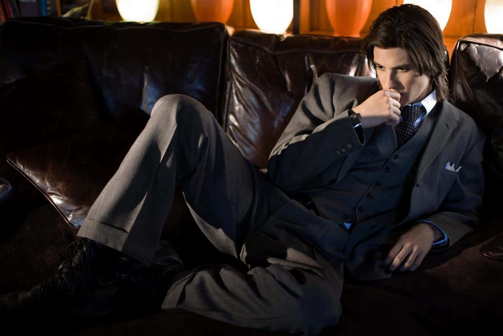 English Actor Ben Barnes Posing In A Suit Background