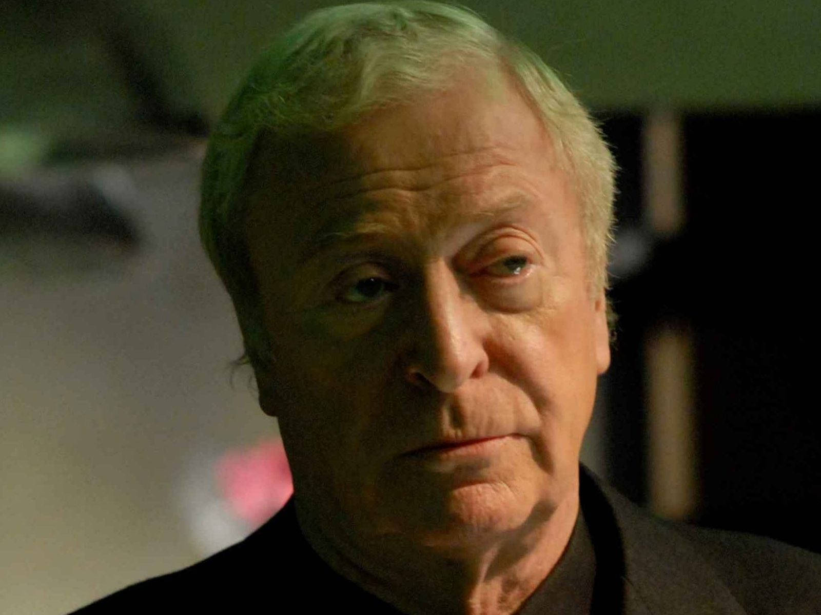 English Actor Michael Caine As Alfred Pennyworth Background