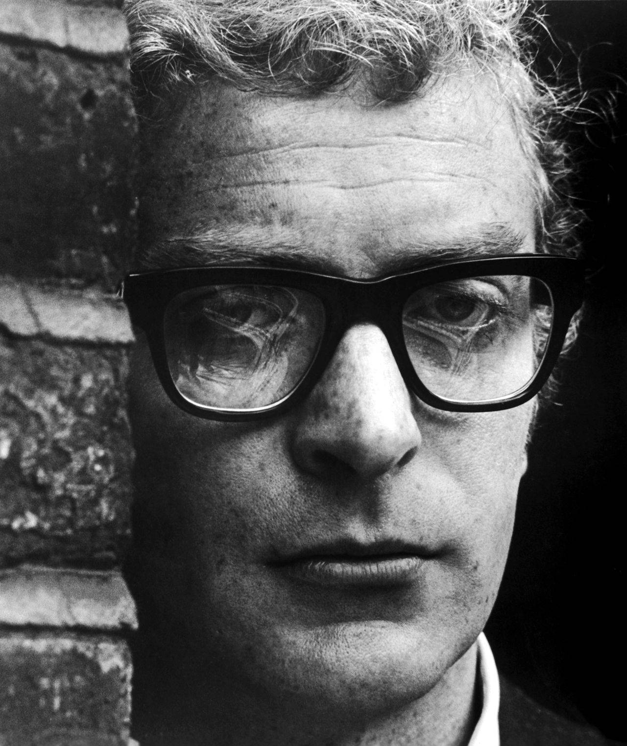 English Actor Michael Caine Grayscale Close Up Shot Background