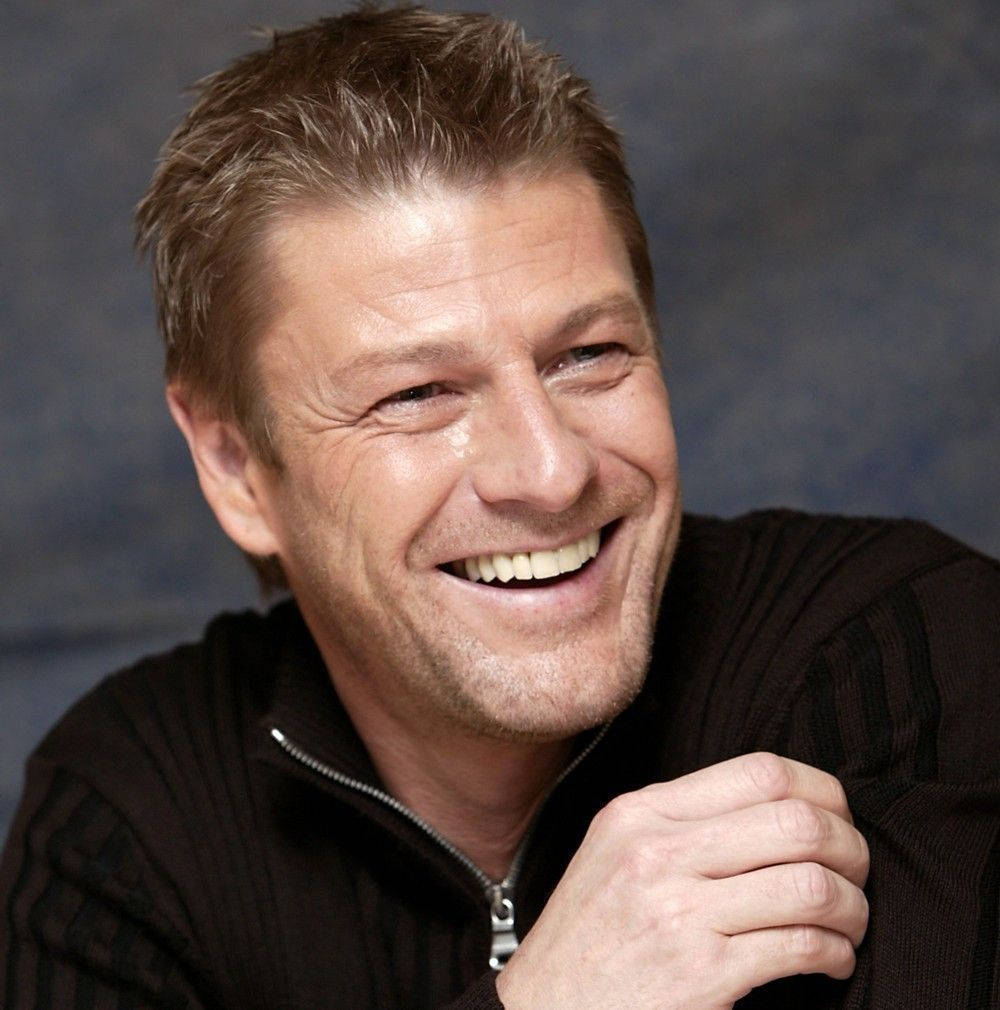 English Actor Sean Bean Cheerful Smile Background