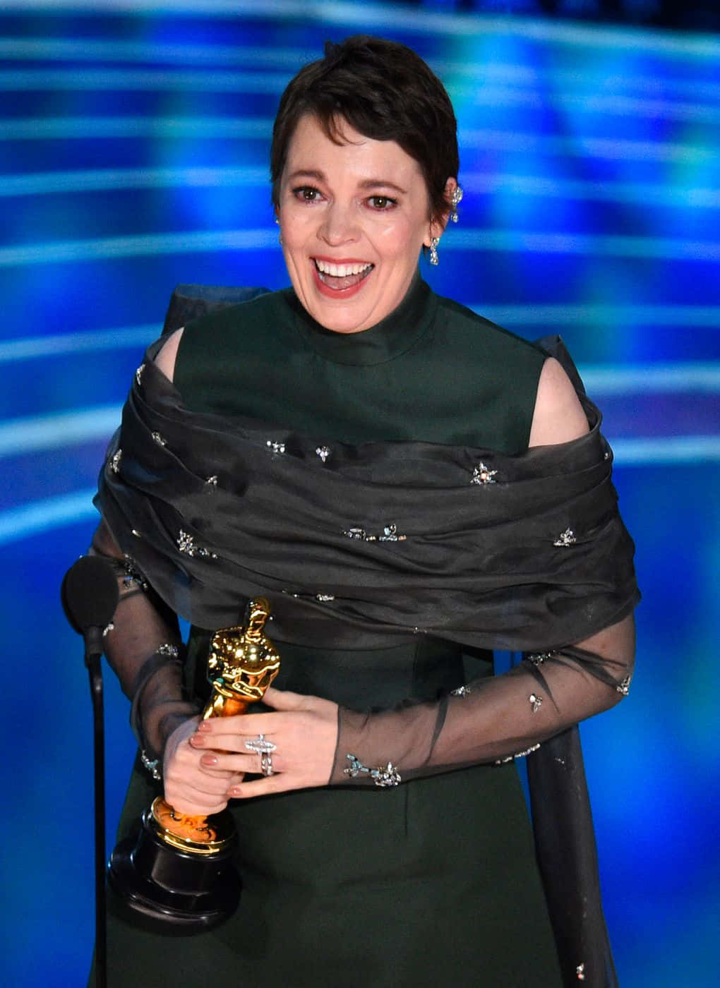 English Actress Olivia Colman At A Red Carpet Event Background