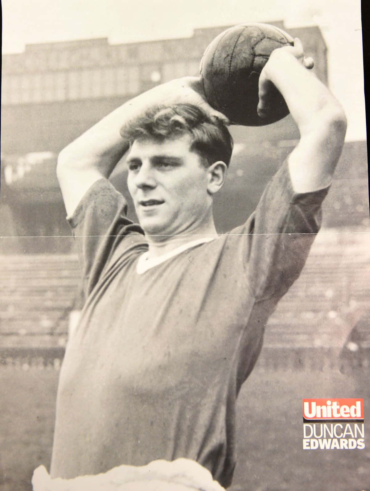 English Footballer Duncan Edwards Throwing The Ball Background