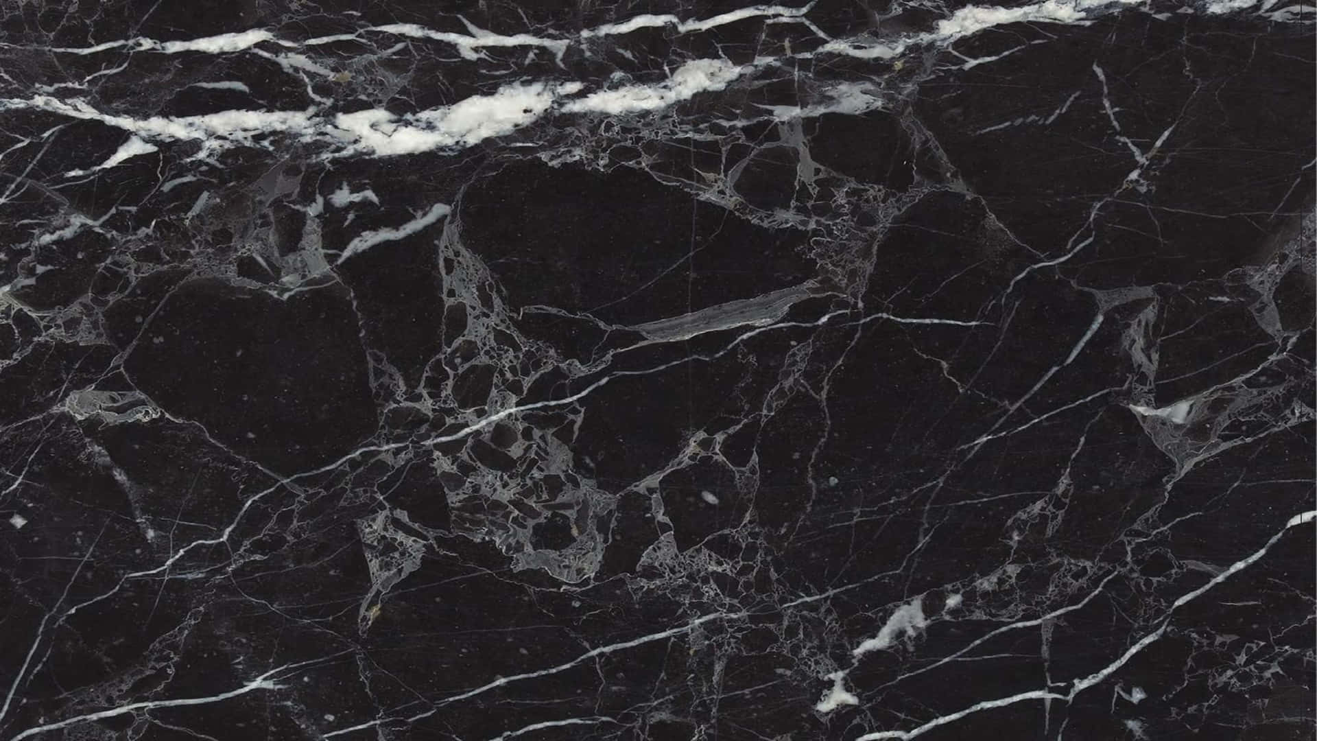 Enhance Your Computing Experience With A Stylish Marble Macbook Background
