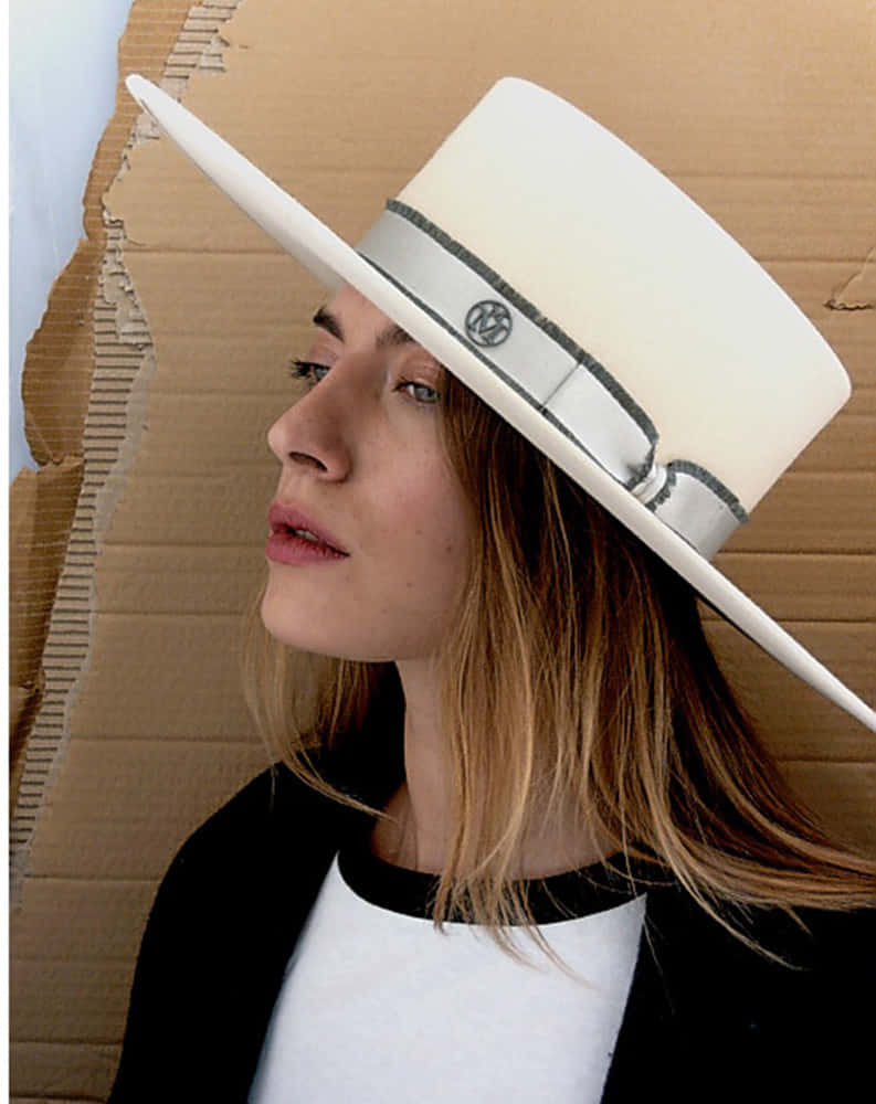 Enhance Your Elegance With Maison Michel Boatman Hat Background