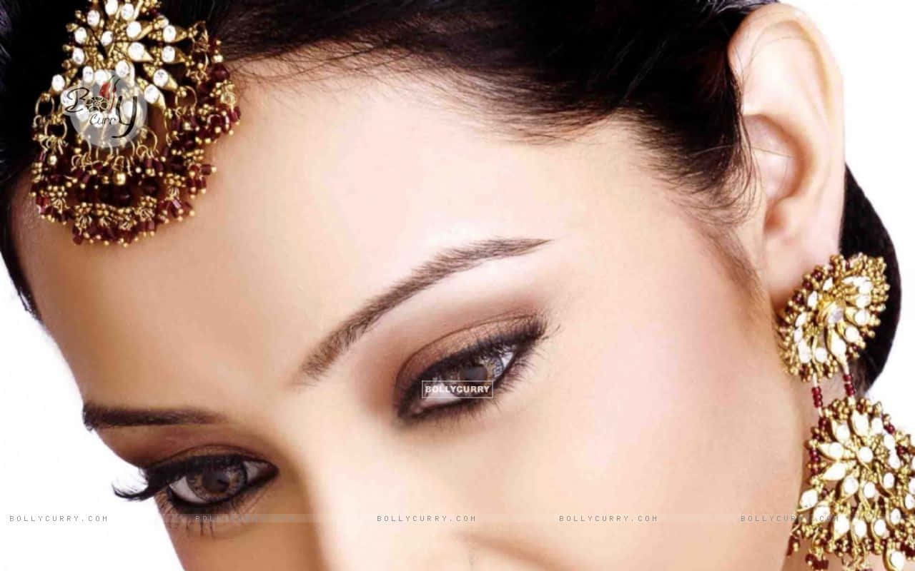 Enhance Your Glam Look With Gold Eyelash Background