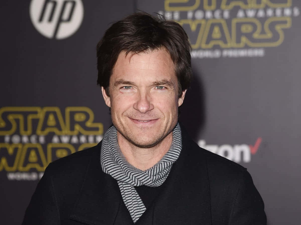 Enigmatic Jason Bateman In A Classic Suit Background