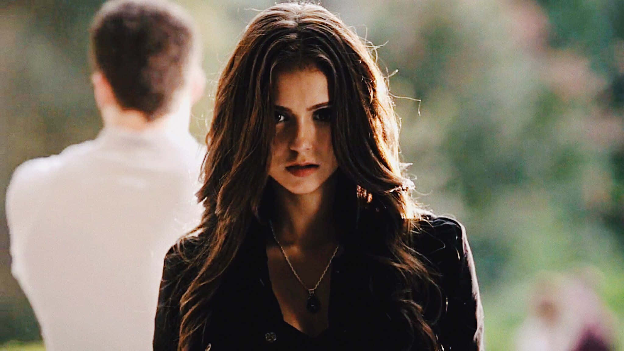 Enigmatic Katherine Pierce From The Vampire Diaries In Eternal Style Background