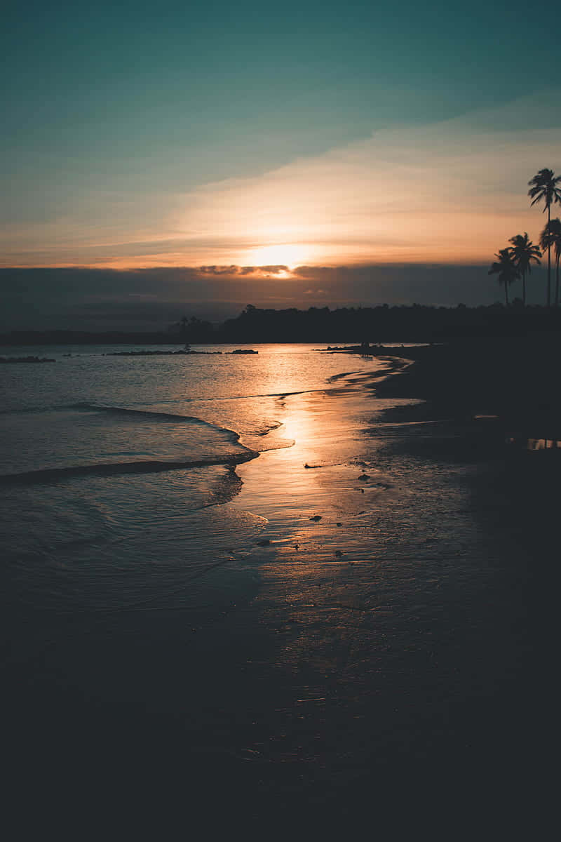 Enjoy A Peaceful Sunset At The Beach.