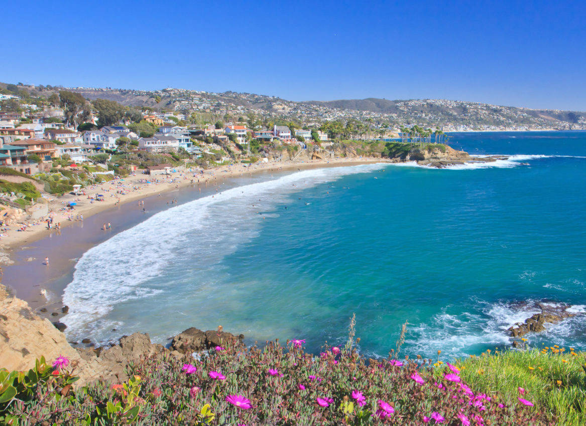 Enjoy A Relaxing Day On A Beautiful Anaheim Beach Background