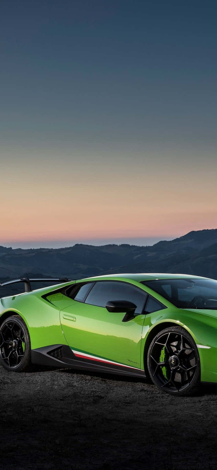 Enjoy A Ride In A Green Lamborghini Background
