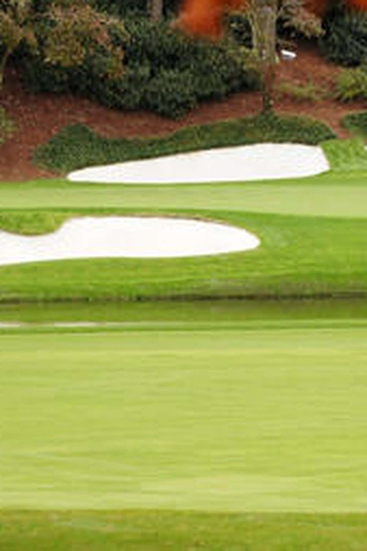 Enjoy A Round Of Golf At The World Famous Augusta National Golf Club Background