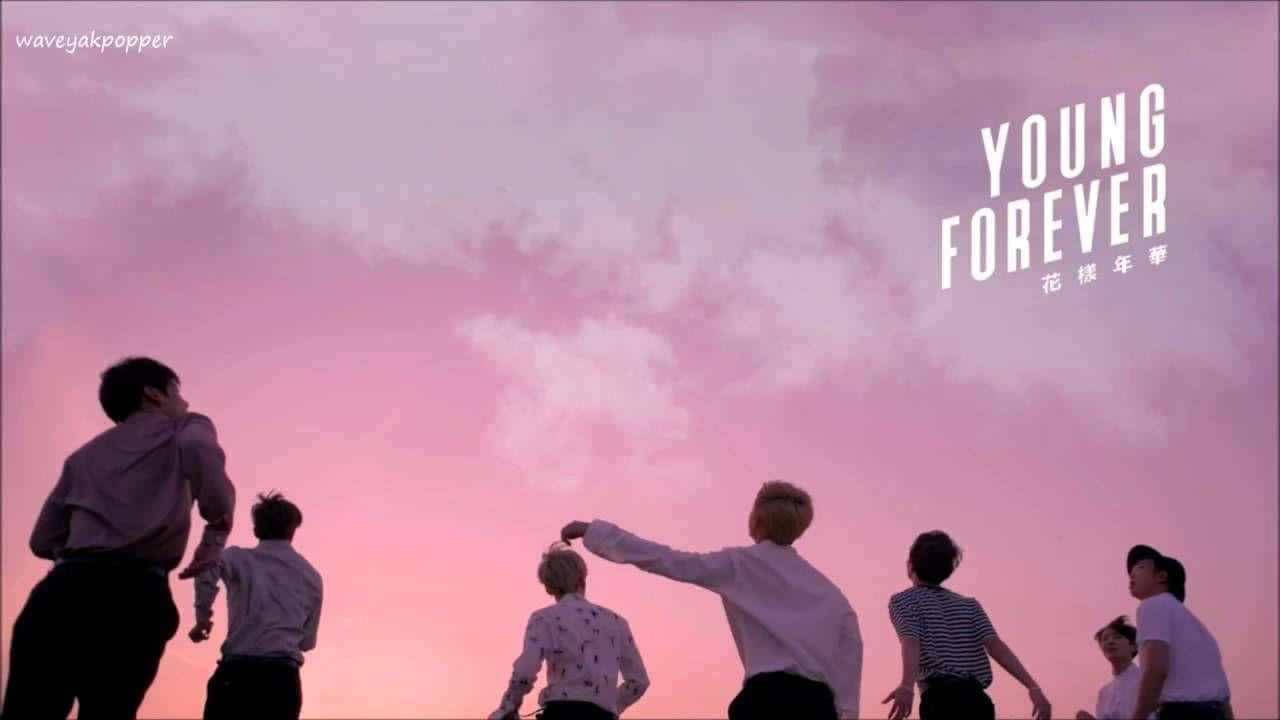 Enjoy A Seamless And Tranquil Desktop With These Soothing Bts Pink Aesthetic Wallpapers Background