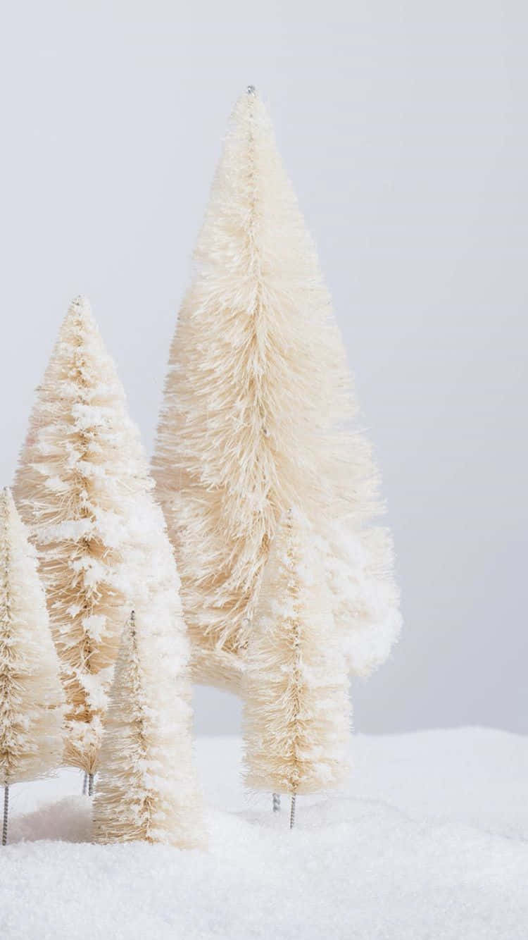 Enjoy A Seasonal White Christmas On Your Iphone Background