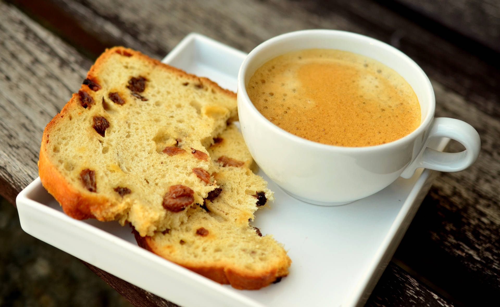 Enjoy A Slice Of Freshly-baked Coffee And Raisin Loaf! Background