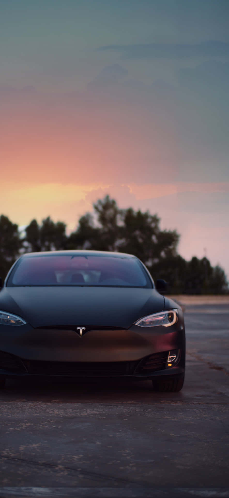 Enjoy A Wireless World With The Tesla Iphone. Background