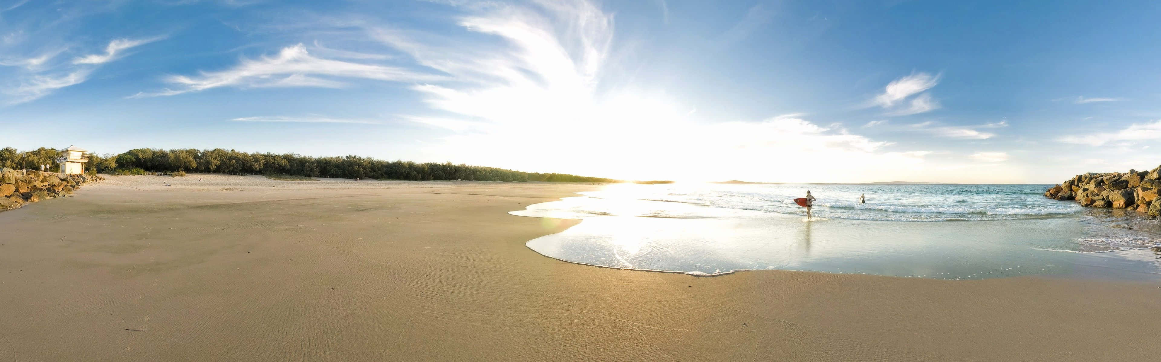 Enjoy An Endless Summer Vibe With Beach Dual Monitor Background