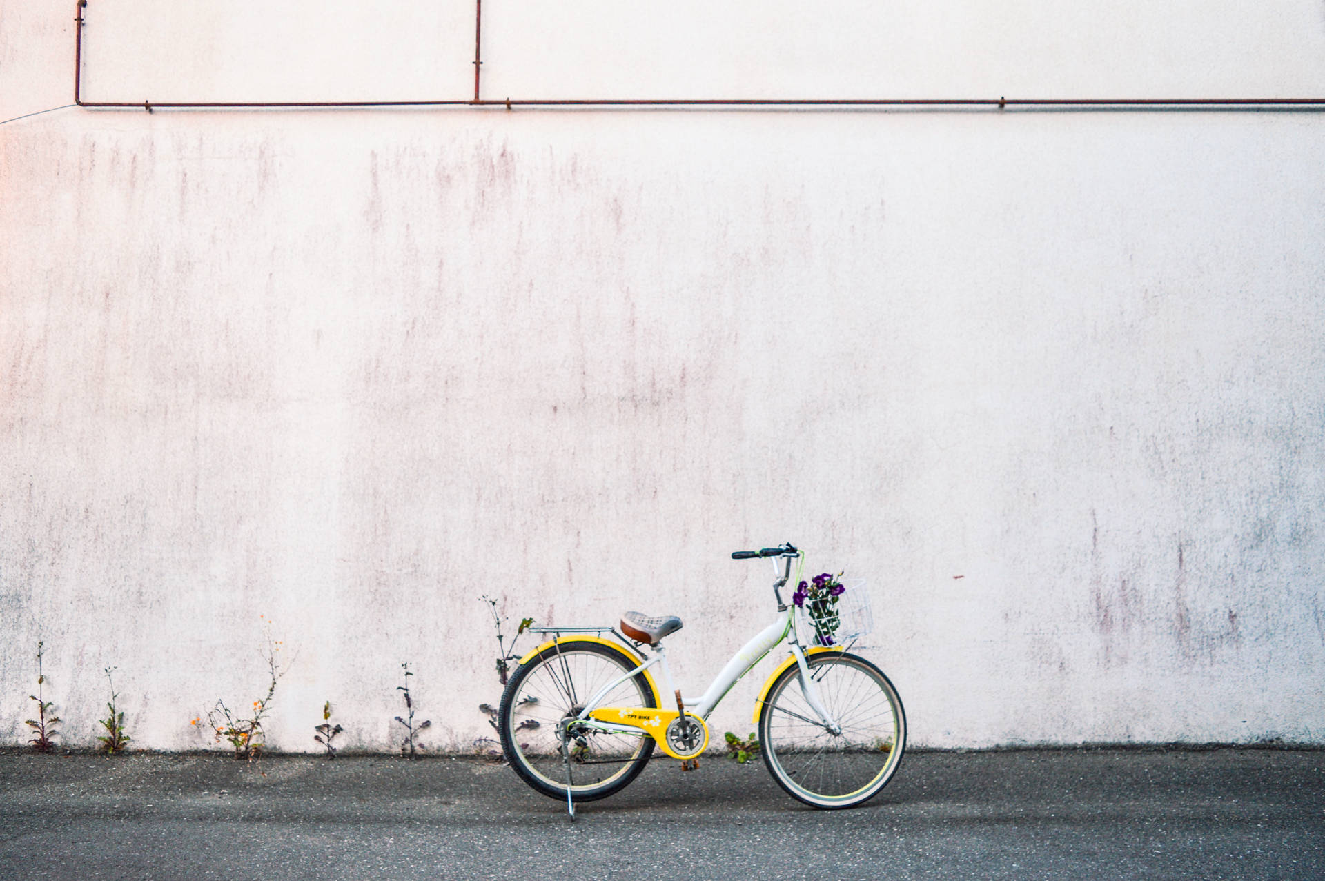 Enjoy Biking With A Yellow City Bike Background