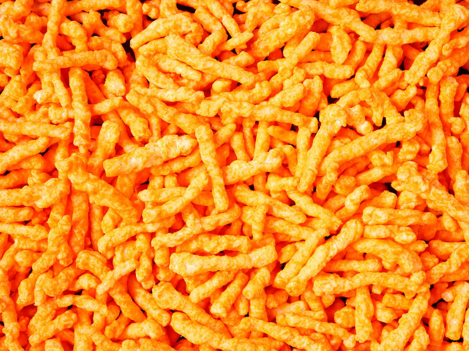 Enjoy Cheetos For A Spicy Snack In A Variety Of Flavors! Background