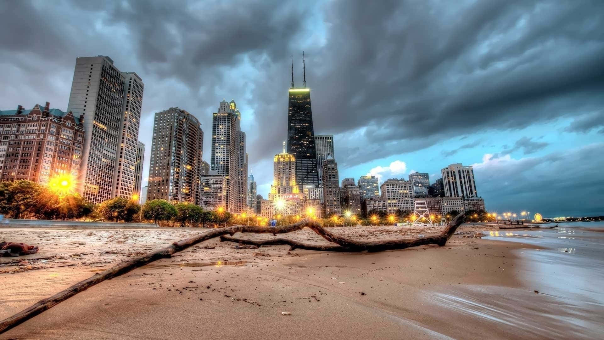 Enjoy The Beautiful View Of A Serene Beach At Sunset