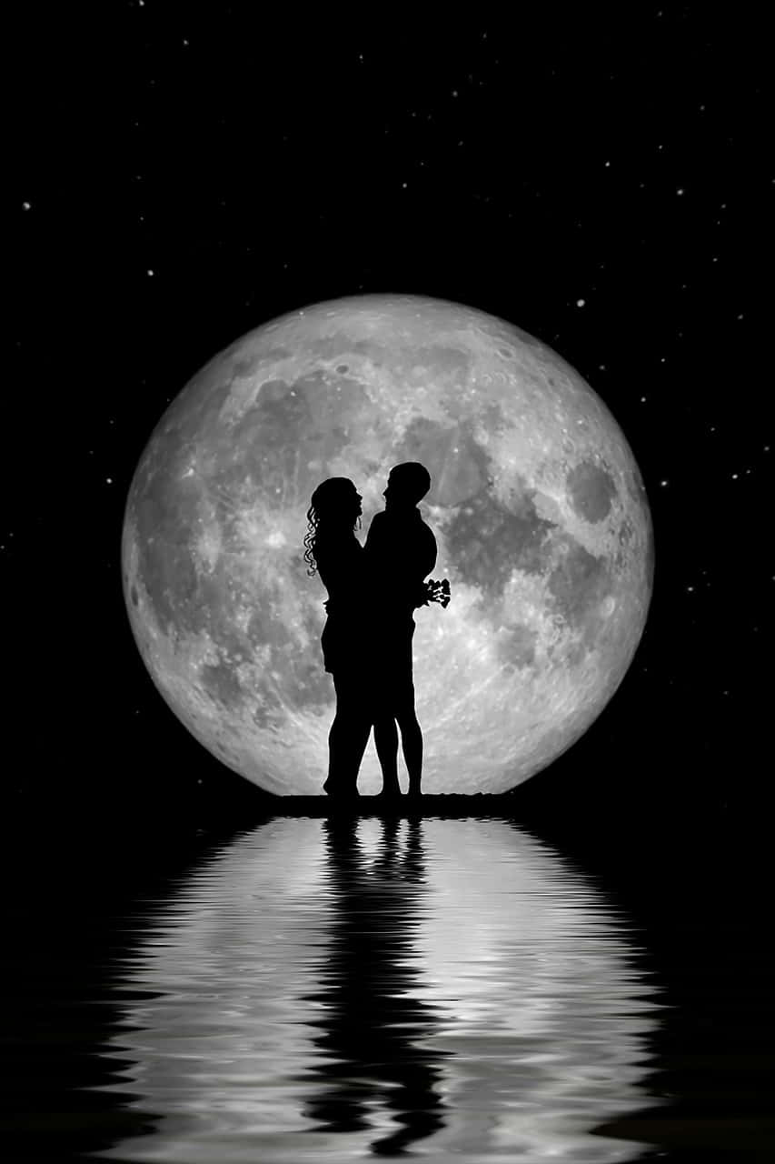 Enjoy The Beauty Of A Brilliant Nigh Time Moon Background
