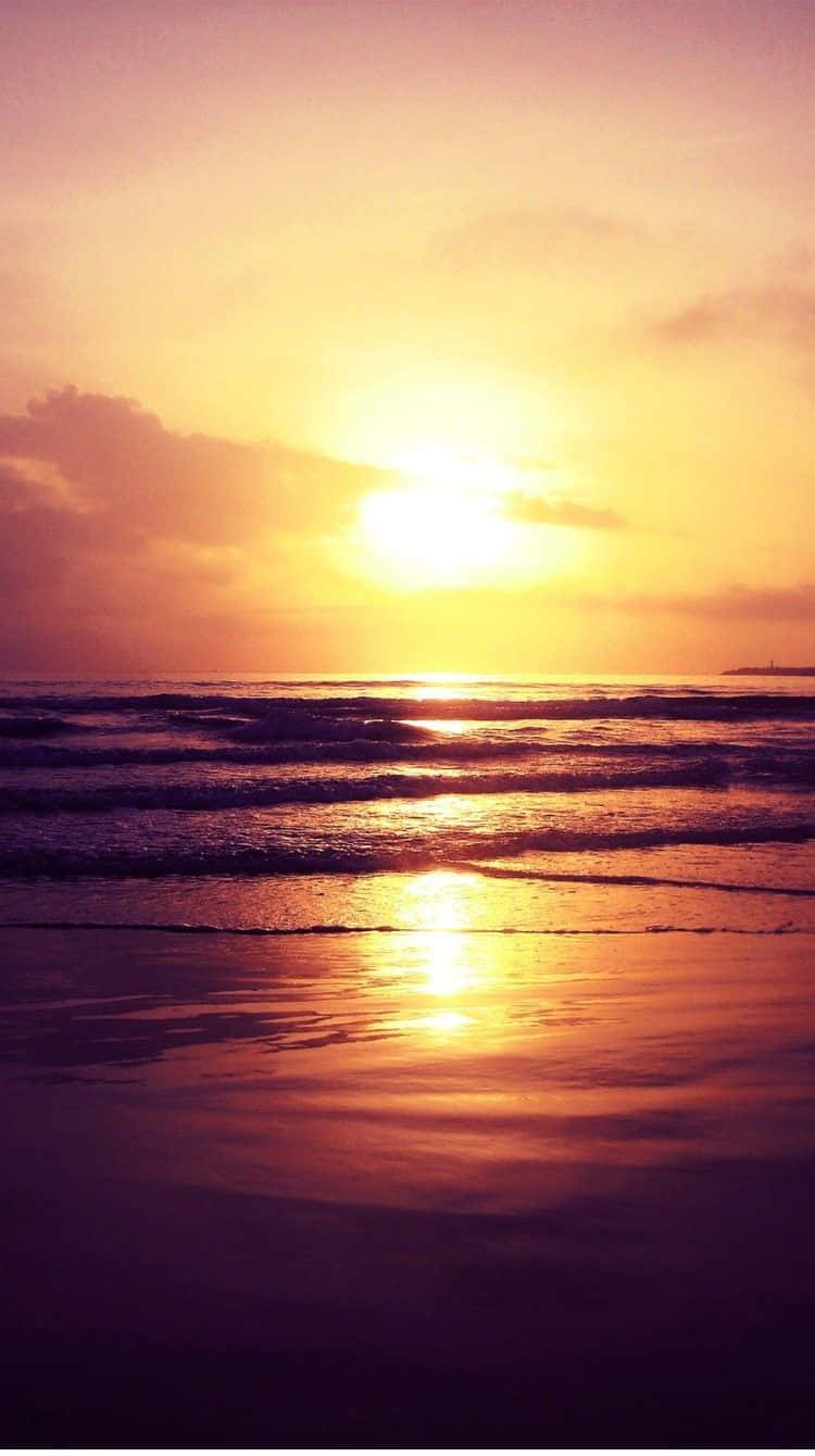 Enjoy The Beauty Of A Stunning Sunset With Your Iphone At The Beach Background