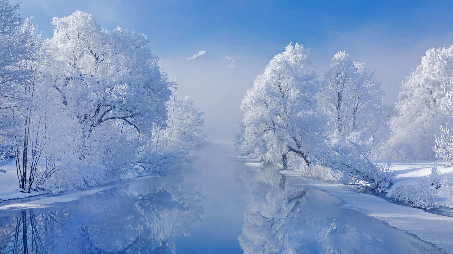 Enjoy The Beauty Of Snow-filled Landscapes With A Great Winter Laptop. Background