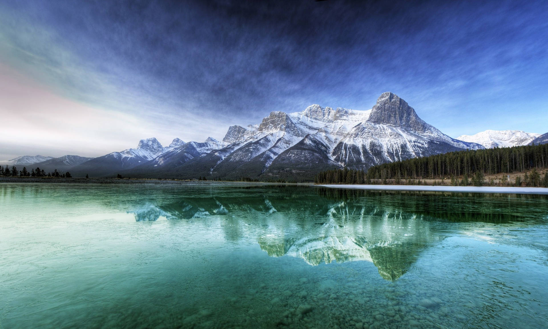 Enjoy The Beauty Of The Rocky Mountains Background