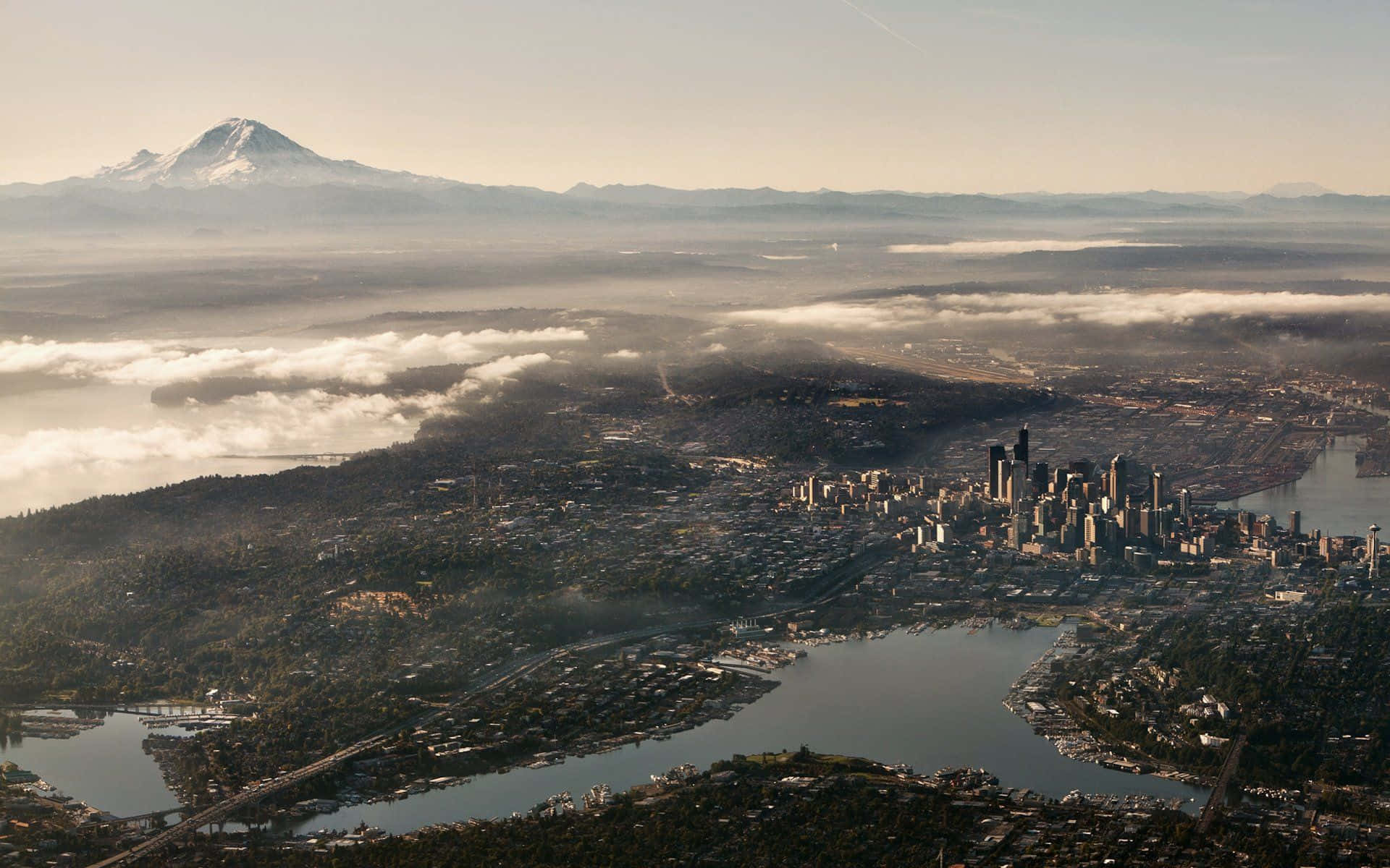 Enjoy The Breathtaking Skyline Of Seattle At Night Background