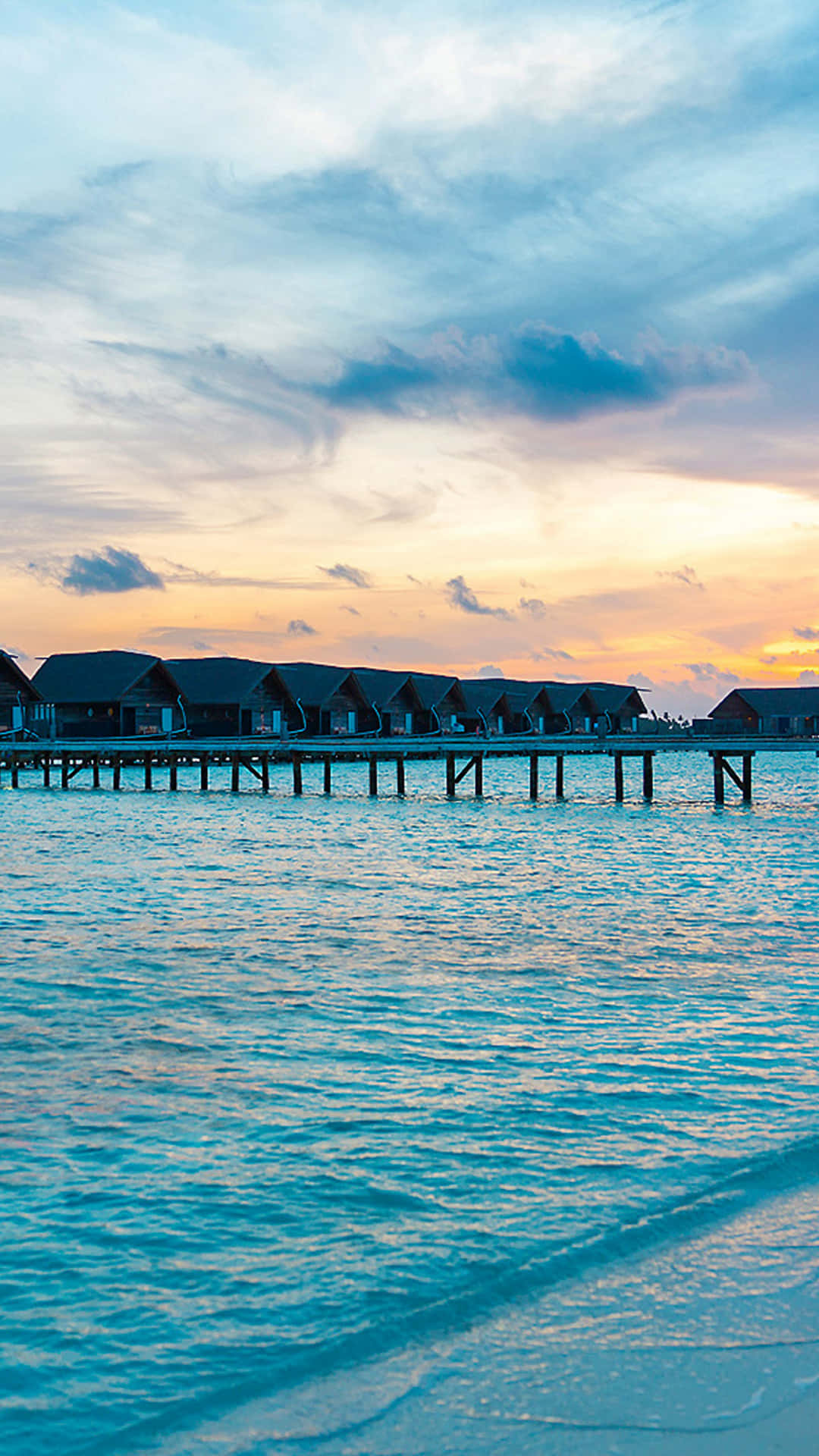 Enjoy The Breathtaking View Of A Hi-res Beach Background