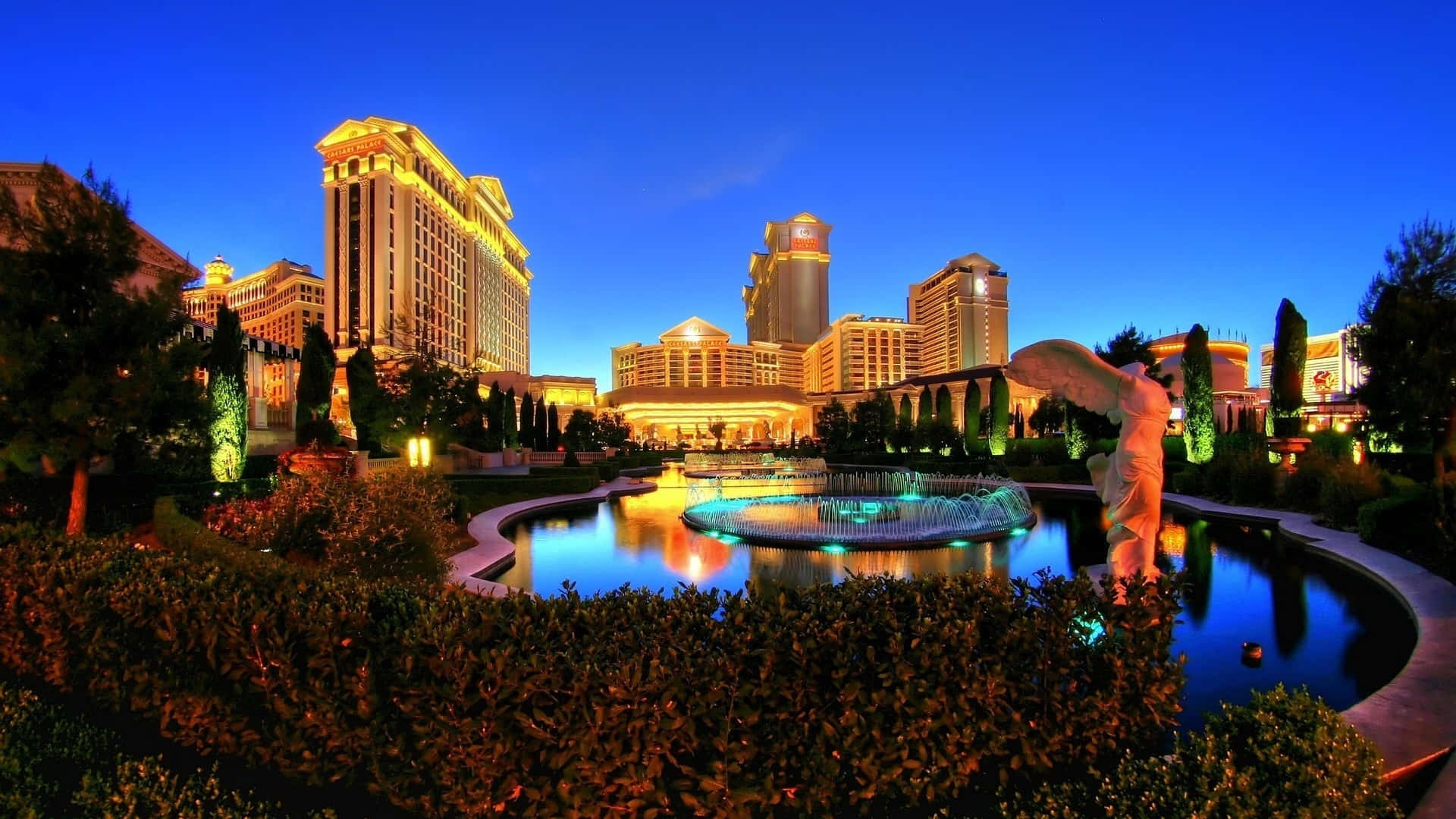 Enjoy The Bright Lights Of Las Vegas At Night Background