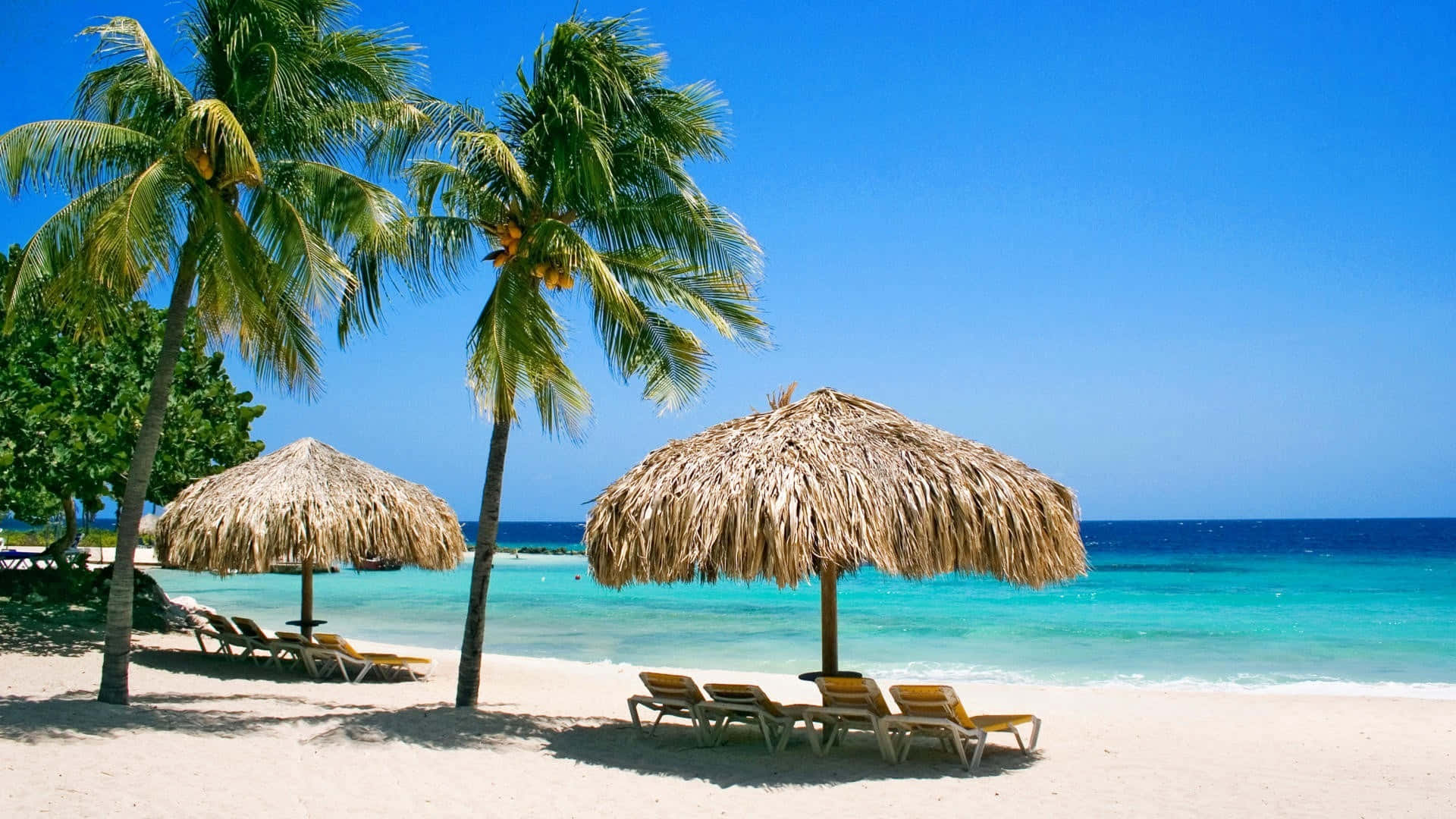 Enjoy The Caribbean Sun On Beautiful Beach Background