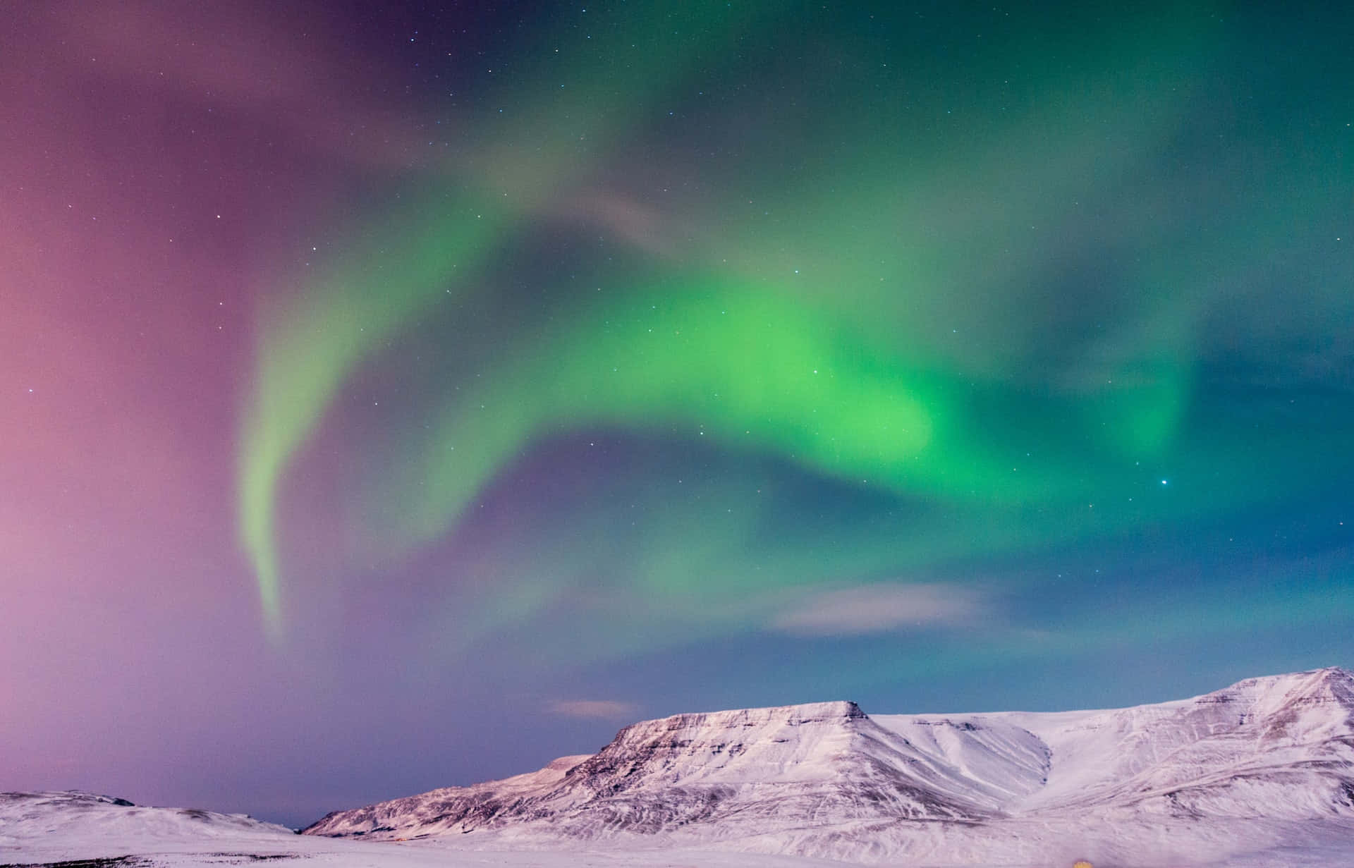 Enjoy The Cascade Of Waterfalls Amidst The Glacial Landscape Of Iceland