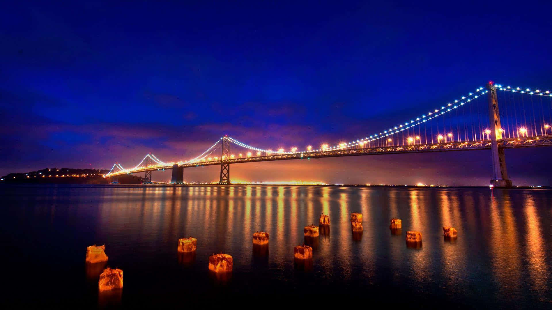 Enjoy The City Skyline While Surfing The Web With San Francisco Laptop Background