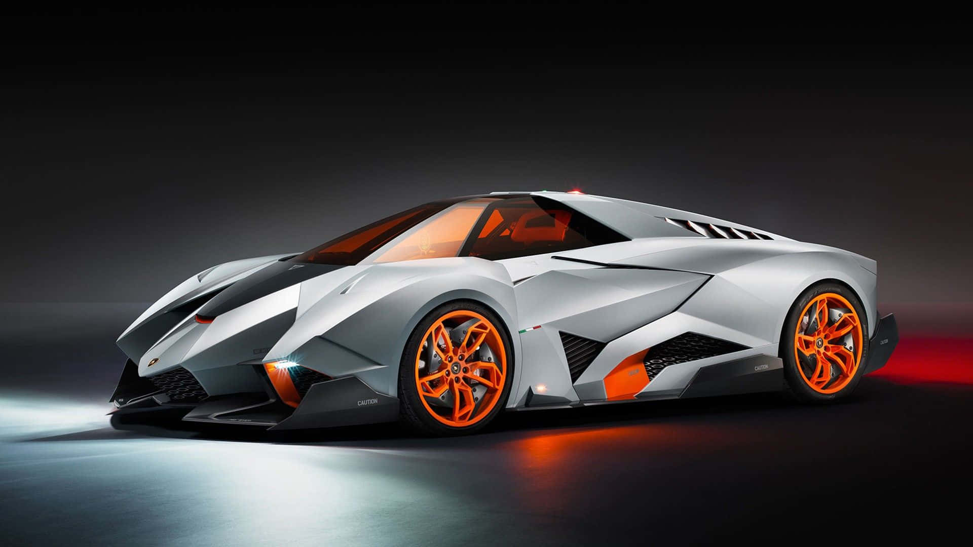 Enjoy The Image Of This Luxury Car Driving Through An Urban Landscape Background