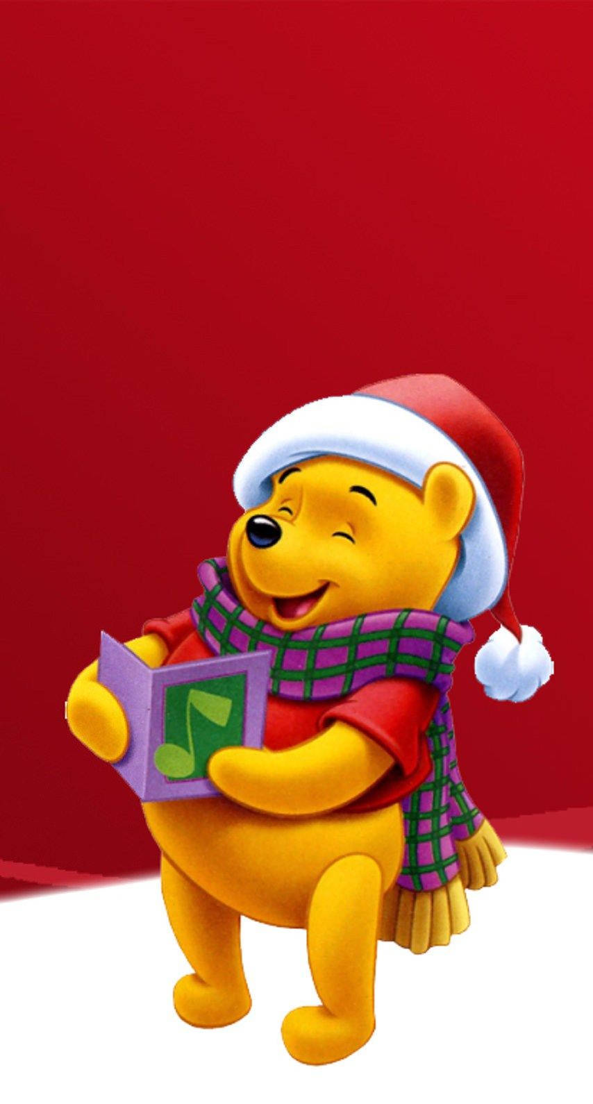 Enjoy The Magic Of Christmas With Winnie The Pooh Background