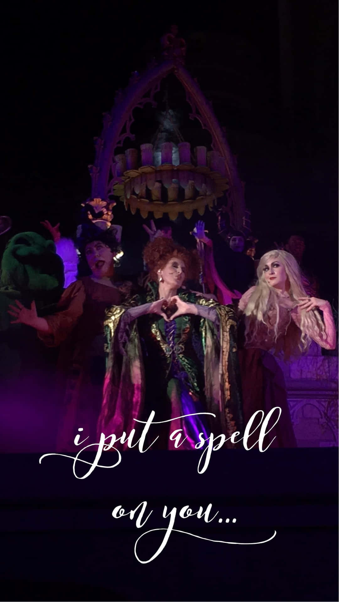 Enjoy The Magical Delights Of Hocus Pocus On Your Iphone Background