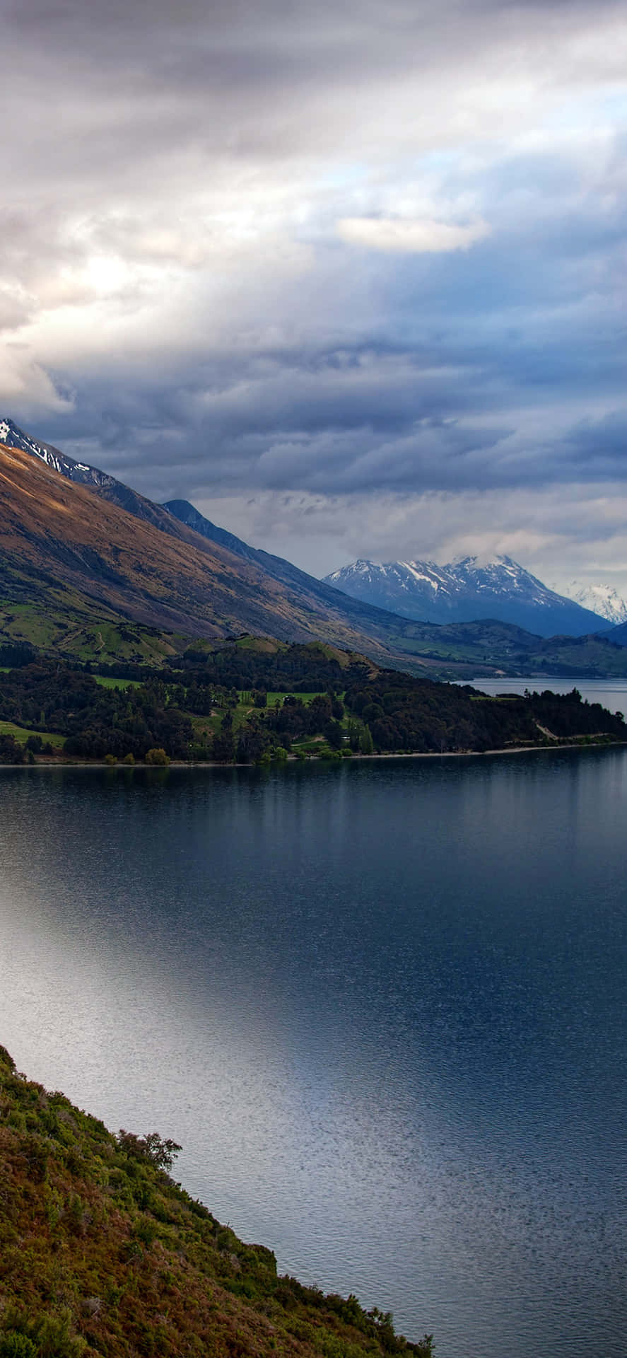 Enjoy The Peaceful Beauty Of Nature In One Of The Most Beautiful Mountain Lakes In The World. Background