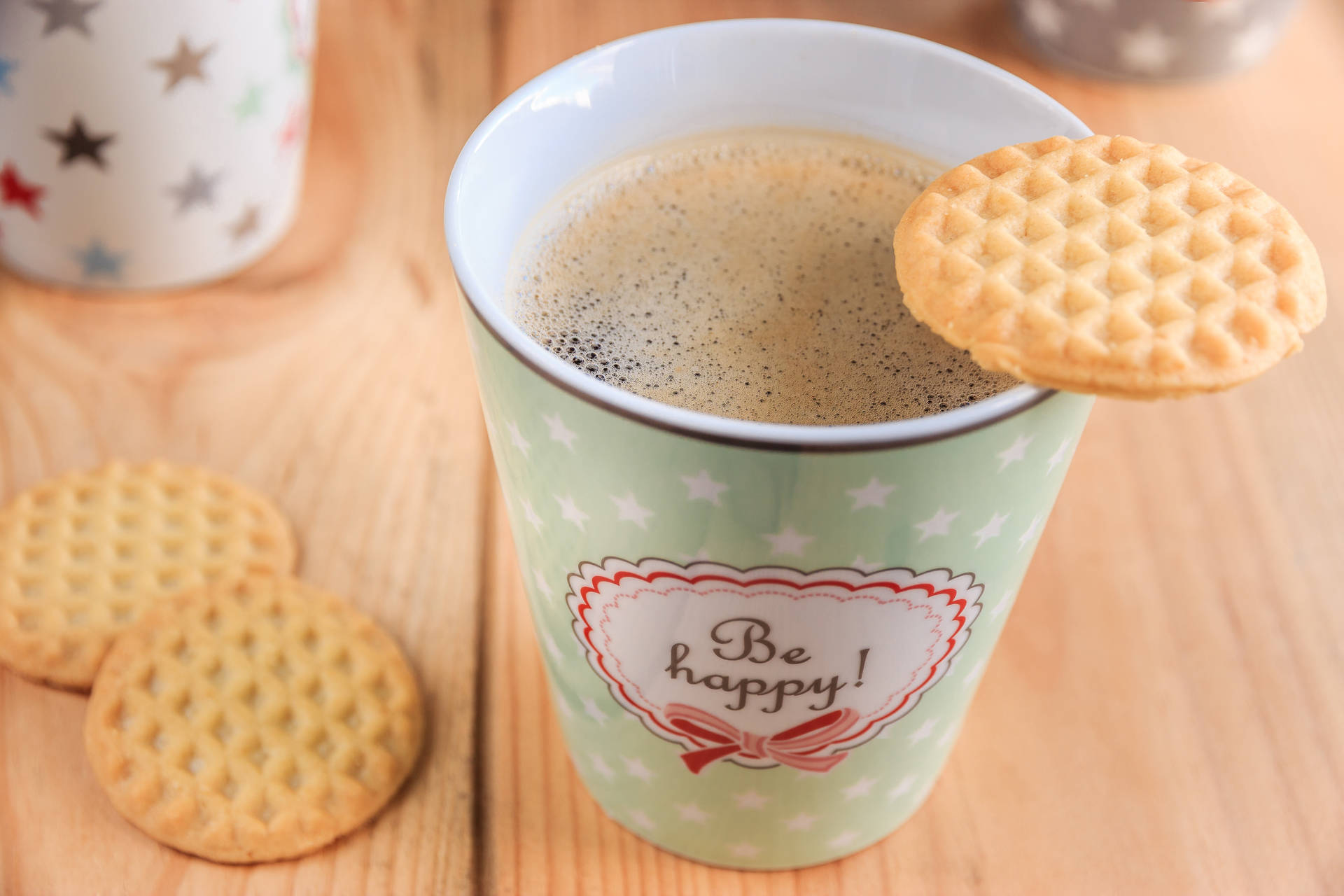 Enjoy The Perfect Afternoon Snack With A Delicious Cup Of Coffee Background