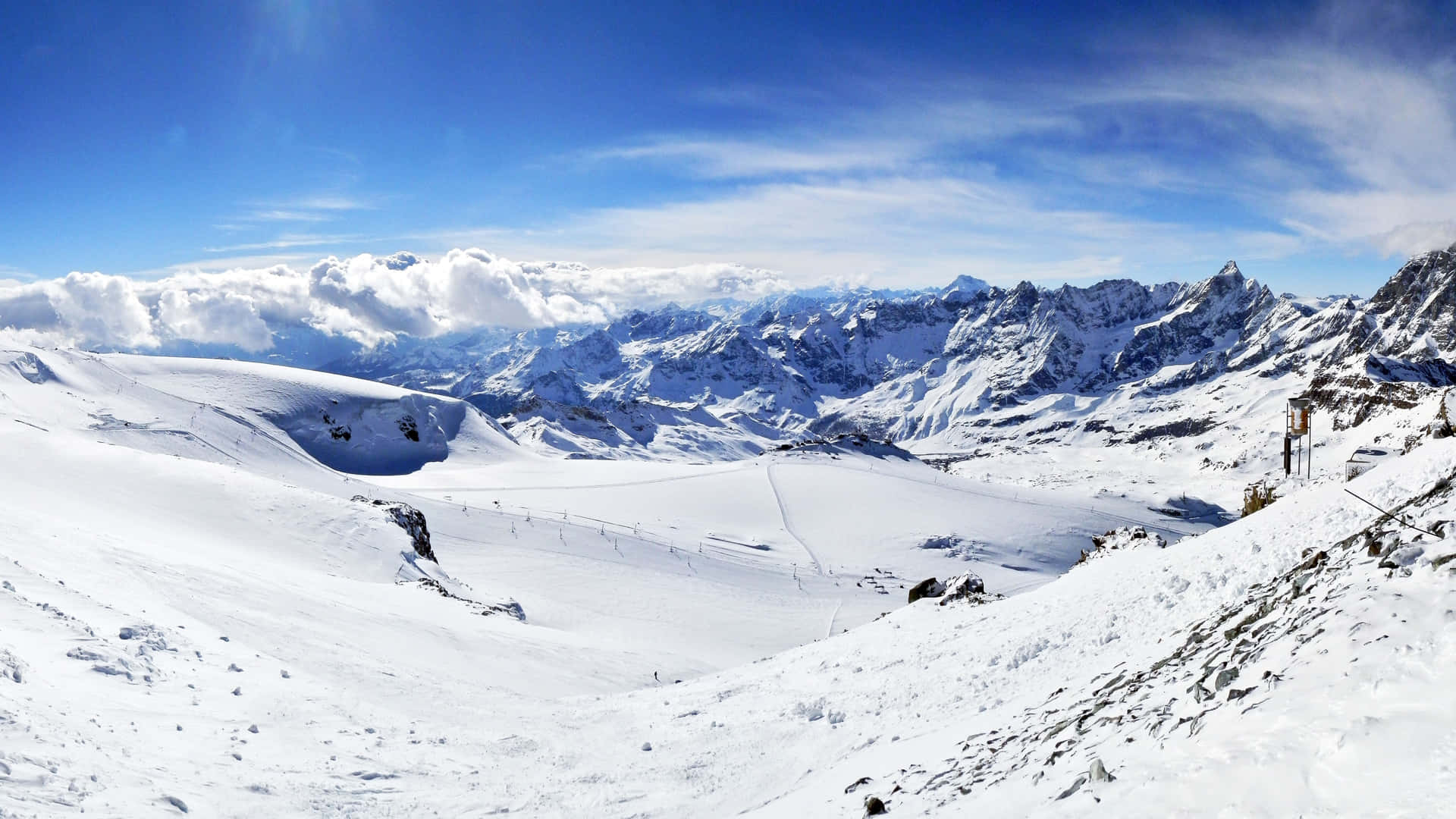 Enjoy The Powdery Snow And Majestic Views Of Ski Mountain! Background