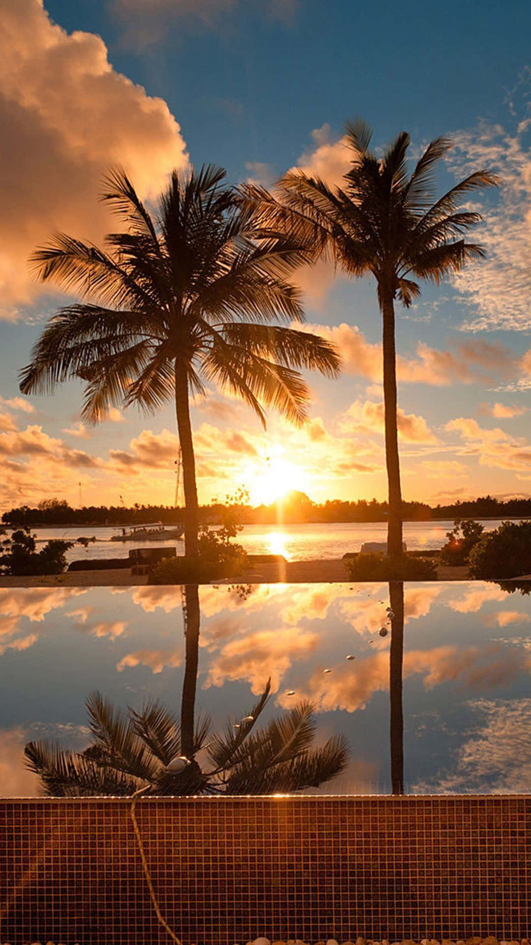 Enjoy The Relaxing Colors Of Sunset Beach Background