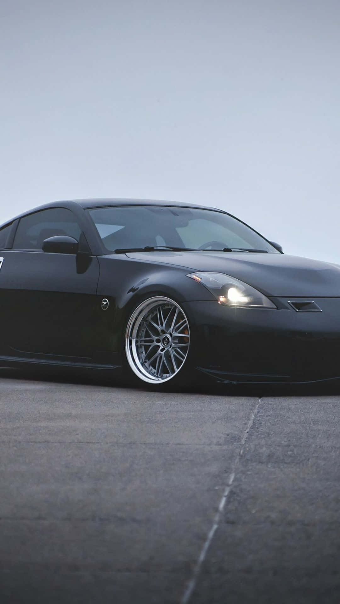 Enjoy The Ride With The Sleek And Stylish Nissan 350z Background