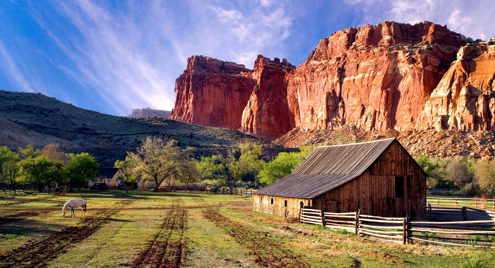 Enjoy The Scenic View Of A Beautiful Ranch Full Of Nature And Tranquility. Background