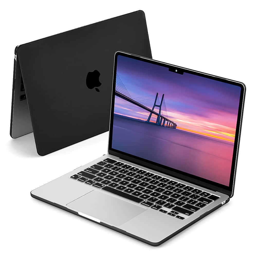 Enjoy The Sleek Design Of The Black Macbook! Background