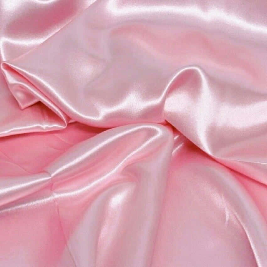 Enjoy The Soft Beauty Of A Pink Silk Aesthetic Background
