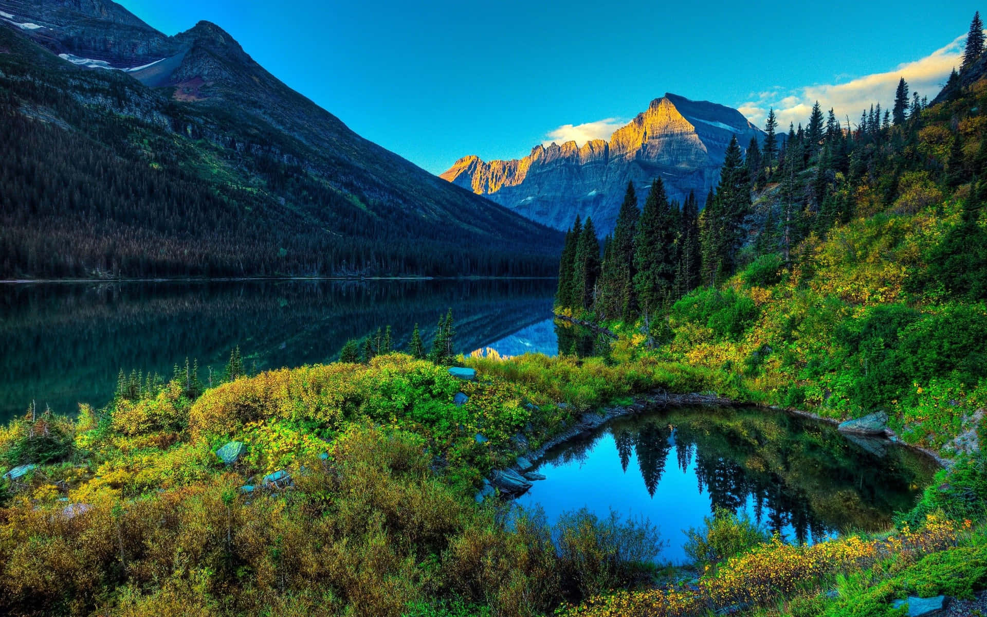 Enjoy The Stunning Landscape Of Snow-covered Mountains. Background