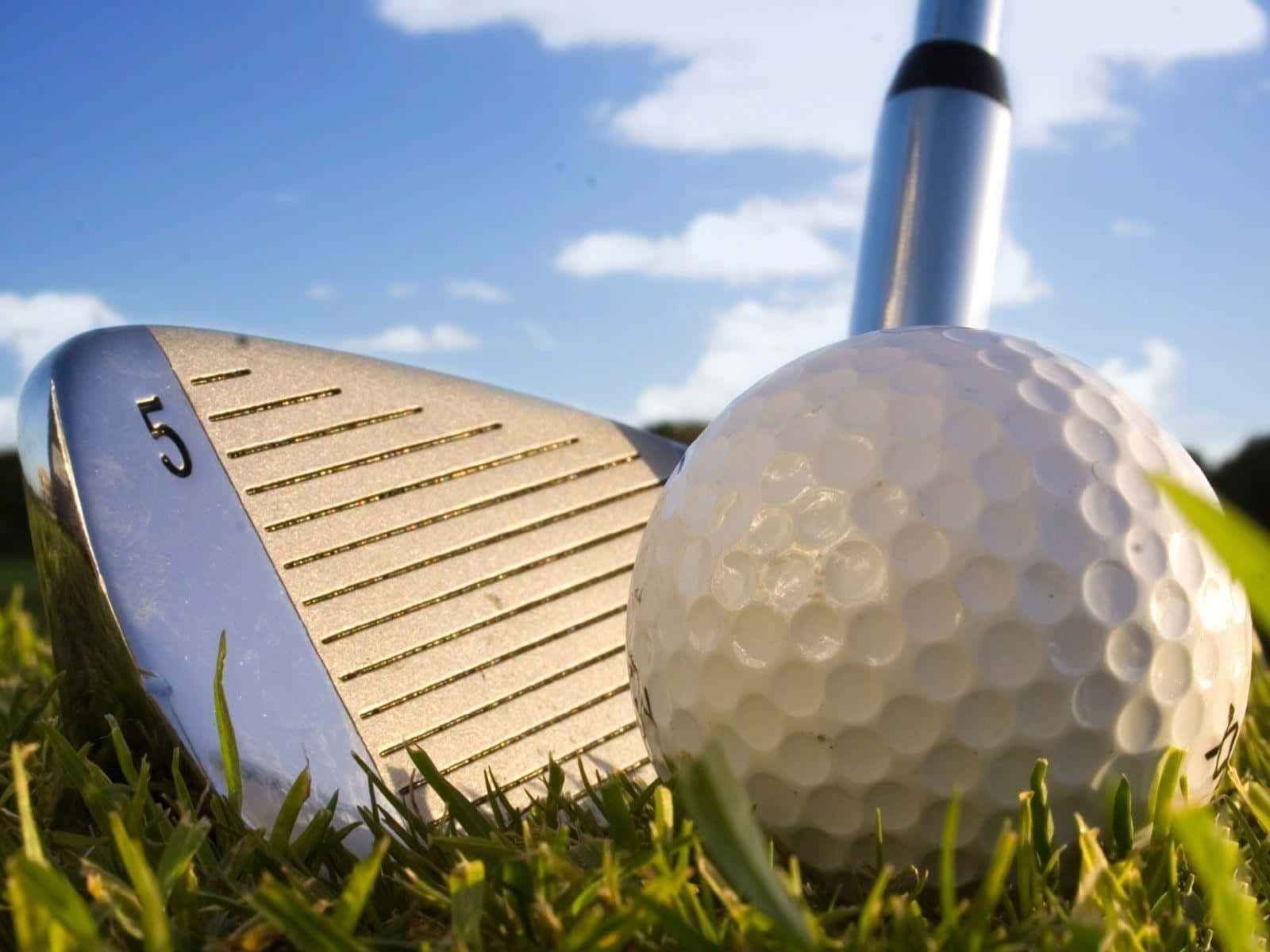 Enjoy The Thrill Of Golf On Your Desktop Background